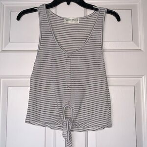 Pants Store brand tank top.